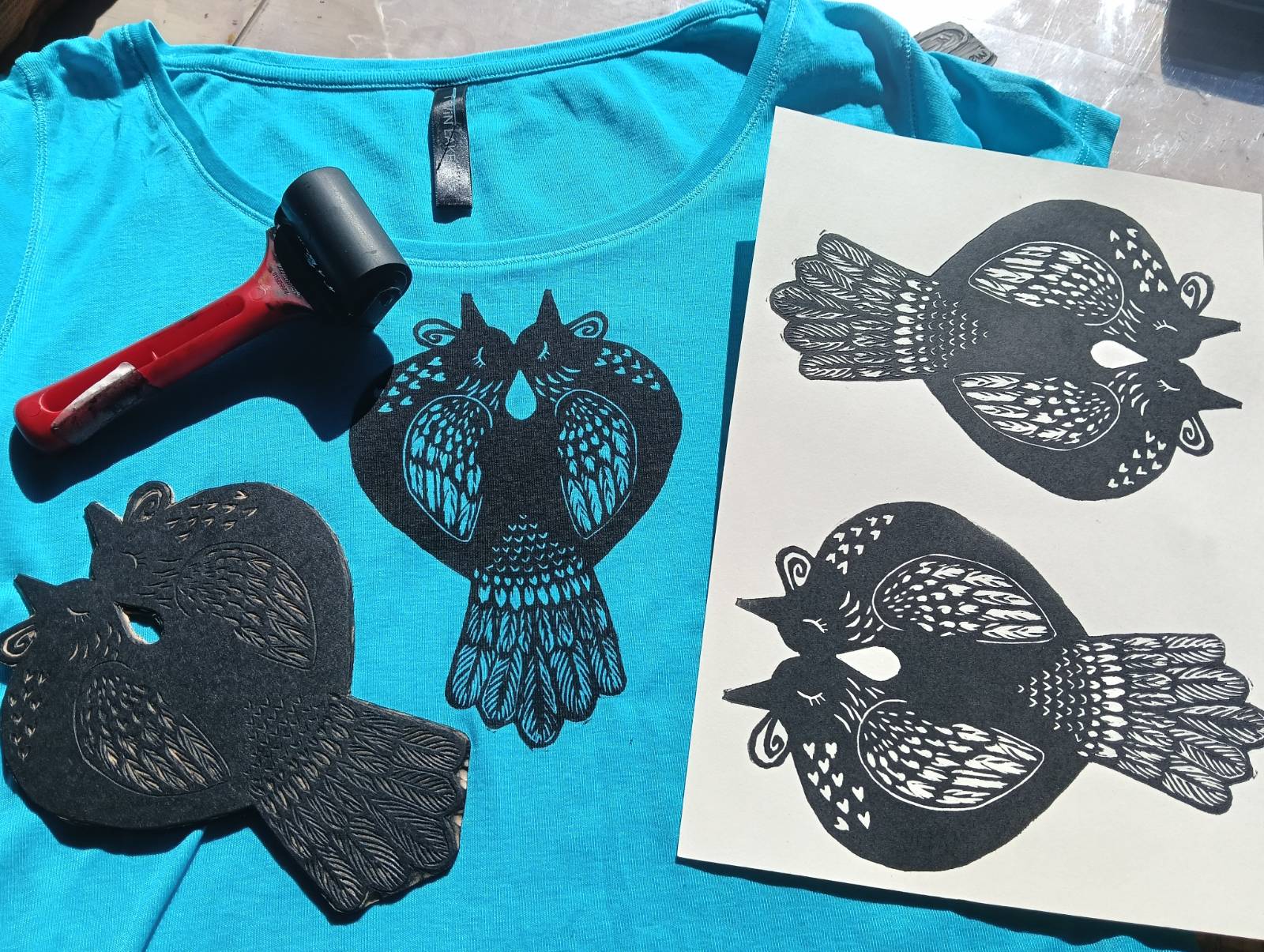 A fresh print onto paper and a t-shirt